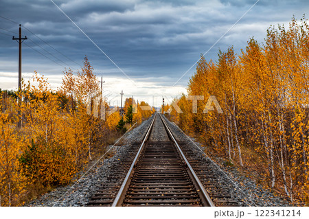 Empty railroad on a picturesque autumn cloudy day 122341214