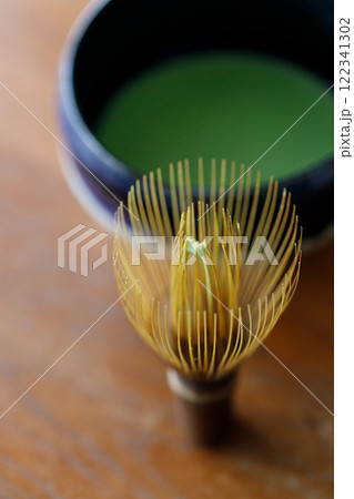 Beautiful purplish red roses under sunlight in rose garden. Floral natural background with rose flower. 122341302