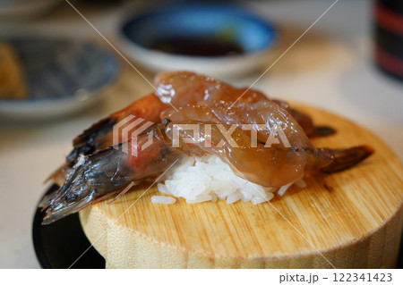 Sushi made with soy sauce shrimp 122341423