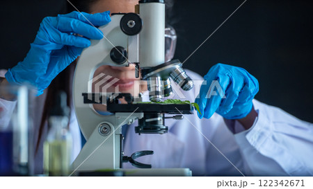 Science laboratory woman research for marijuana natural aromatic hemp oil Science laboratory woman research for marijuana natural aromatic hemp oil 122342671