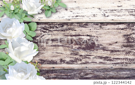 White roses on old wooden board. Valentine's day horizontal banner with romantic and vintage touch. Mother's day background with branch of climbing rose to express love, gratitude. Copy space for text 122344142