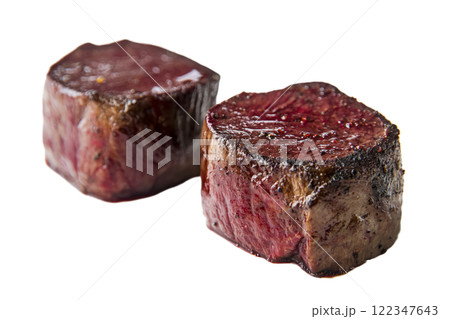 Venison steaks, dark red and lean, on a white background 122347643