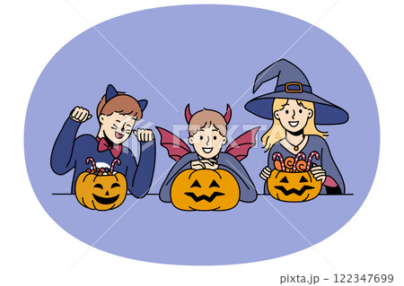 Children in halloween attire hold pumpkins with treats, rejoicing in coming of october 31st holiday Children in halloween attire hold pumpkins with treats, rejoicing in coming of october 31st holiday 122347699