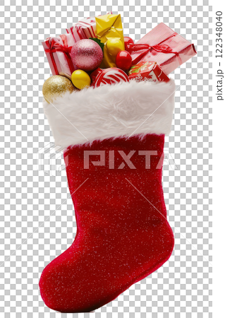 A red and white Christmas stocking filled with small gifts , candy poking out from the top. 122348040