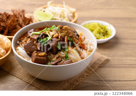Northern Thai food, Spicy rice noodles soup with pork eating with fresh vegetables, Local Thai food 122348066