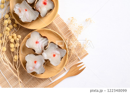 Sticky rice cake with coconut filling on white background with copy space, Chinese New Year cake Sticky rice cake with coconut filling on white background with copy space, Chinese New Year cake 122348099