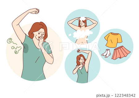 Woman fights smell of sweat by using deodorant and putting on clean clothes after taking shower 122348342