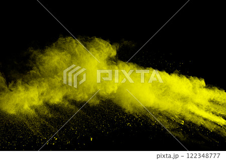 Yellow dust particles explosion on black background.Yellow powder splash. Yellow dust particles explosion on black background.Yellow powder splash. 122348777