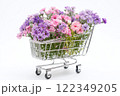 Shopping cart with summer flowers on white background 122349205
