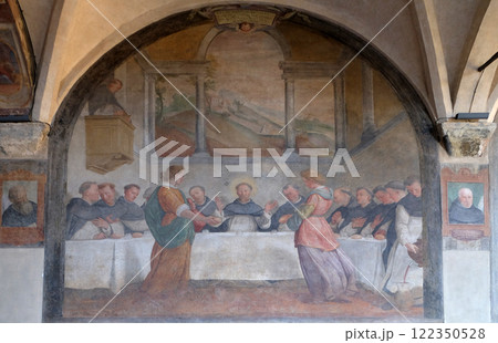 San Dominic in Mensa fed by the Angels, fresco by Santi di Tito in the cloister of Santa Maria Novella Principal Dominican church in Florence, Italy San Dominic in Mensa fed by the Angels, fresco by Santi di Tito in the cloister of Santa Maria Novella Principal Dominican church in Florence, Italy 122350528