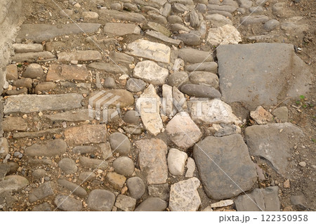 Narrow cobble stone street in Old town Berat, Albania 122350958