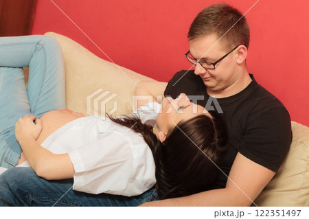 Pregnant woman with her man husband Pregnant woman with her man husband 122351497