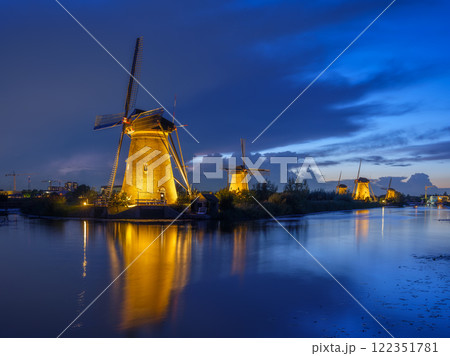 Old windmills in the Netherlands. Reflections on the water surface. Old windmills in the Netherlands. Reflections on the water surface. 122351781