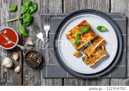 Moussaka, greek beef and eggplant dish, top view Moussaka, greek beef and eggplant dish, top view 122354782