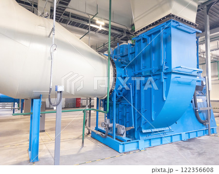 Industrial ventilation machine with blue housing and cylindrical white duct. 122356608