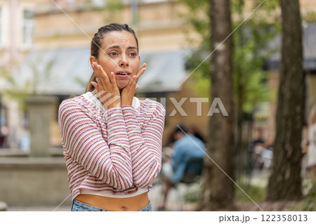 Sad unhappy frustrated woman girl walking alone in city street, feeling bad, annoyed, grief, problem Sad unhappy frustrated woman girl walking alone in city street, feeling bad, annoyed, grief, problem 122358013