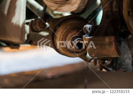 Car Mechanics: Close-Up of a Car's Axle and Differential Assembly Car Mechanics: Close-Up of a Car's Axle and Differential Assembly 122358155