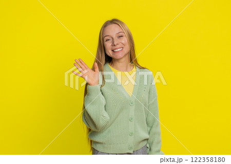 Happy woman smiling friendly waving hands gesturing hello greeting or goodbye, meeting invitation Happy woman smiling friendly waving hands gesturing hello greeting or goodbye, meeting invitation 122358180