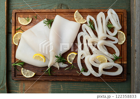 Squid tube and ring photography . Seafood top view 122358833