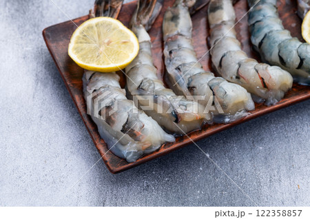Raw big tiger ( king ) shrimps Cleaned, Peeled & Deveined photography . Top view 122358857