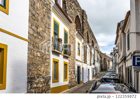 Houses in Evora, Alentejo, Portugal integrated in the ancient Agua da Prata aqueduct. Houses in Evora, Alentejo, Portugal integrated in the ancient Agua da Prata aqueduct. 122359872