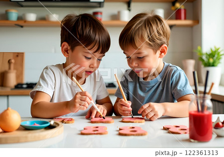 Children paint cookies with food coloring, preparing surprise for mom on March 8 Children paint cookies with food coloring, preparing surprise for mom on March 8 122361313