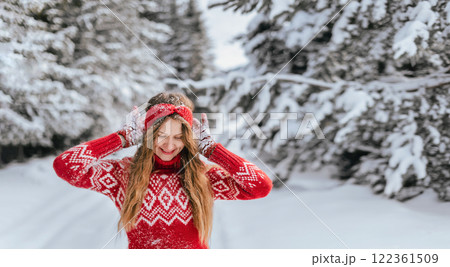 Happy Smiling Woman in Snowy Winter Forest Happy Smiling Woman in Snowy Winter Forest 122361509