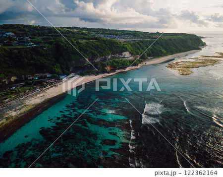 Pandawa beach with coastal landscape, ocean and cloudy sky with morning sunlight in Bali. 122362164