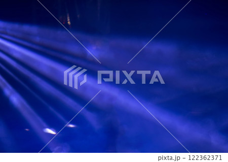 Blue rays in the smoke from stage spotlights. Blue rays in the smoke from stage spotlights. 122362371