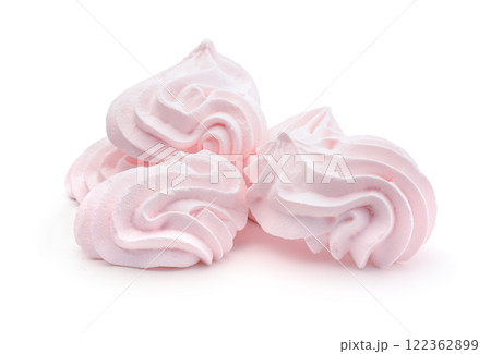 Several meringues isolated on white. 122362899