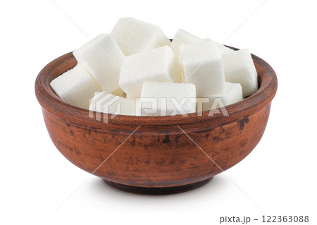 Sugar cubes in a ceramic bowl isolated on white background Sugar cubes in a ceramic bowl isolated on white background 122363088