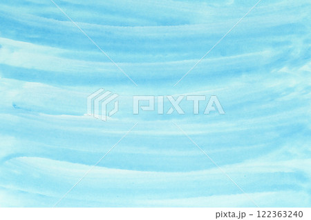 Abstract blue watercolor background. The color splashing on the paper. Hand drawn. Abstract blue watercolor background. The color splashing on the paper. Hand drawn. 122363240