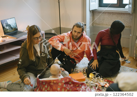 Enjoying a cozy, intimate gathering with close friends and our baby in a modern space Enjoying a cozy, intimate gathering with close friends and our baby in a modern space 122364502