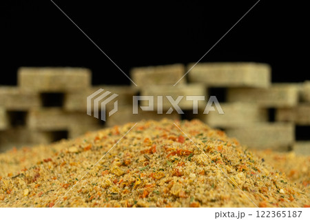Instant bouillon and spice mix in cubes and powder 122365187