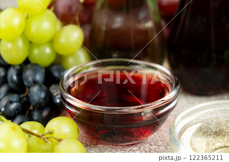 Natural Organic Wine Vinegar Among Grapes 122365211