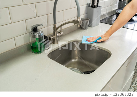 Bearded Man Cleaning the Kitchen 122365328