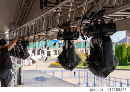 Installation of lighting equipment on a mobile concert stage. Installation of lighting equipment on a mobile concert stage. 122365825