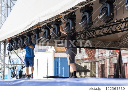 Installation of lighting equipment on a mobile concert stage. Installation of lighting equipment on a mobile concert stage. 122365880