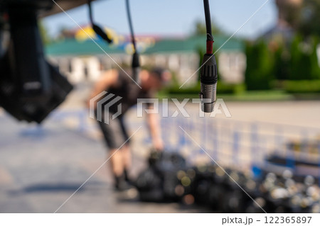 Installation of lighting equipment on a mobile concert stage. 122365897