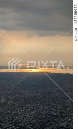 View of New York from an airplane. Vertical. Sunset 122366436