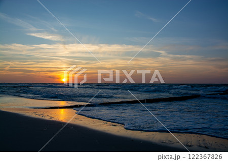 Sunset at Zingst Beach, Darss, Germany Sunset at Zingst Beach, Darss, Germany 122367826
