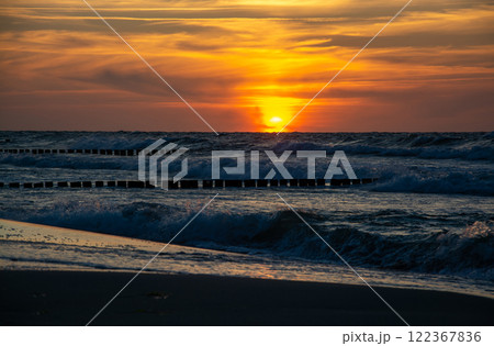 Sunset at Zingst Beach, Darss, Germany Sunset at Zingst Beach, Darss, Germany 122367836
