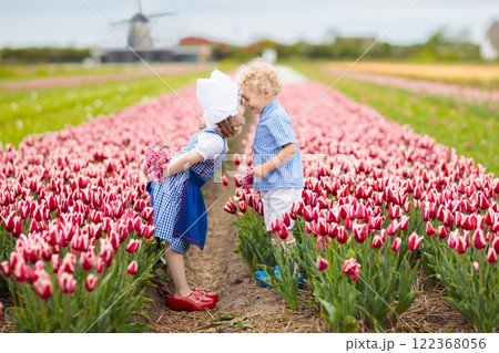 Dutch children in tulip field Dutch children in tulip field 122368056