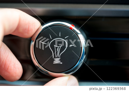 Button with a hand-drawn illuminated light bulb Button with a hand-drawn illuminated light bulb 122369368