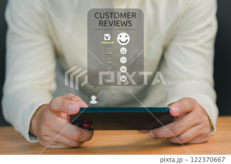 Customer engage in a satisfaction survey, using an online application to rate their service experiences. This evaluation helps determine the quality of service and business reputation rating. 122370667