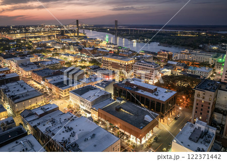 Aerial view of Broughton Street in Savannah, old historical city in Georgia. Southern American architecture at night Aerial view of Broughton Street in Savannah, old historical city in Georgia. Southern American architecture at night 122371442