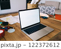 Laptop with blank screen on table 122372612