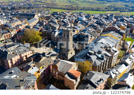 Aerial view of Spanish town of Puigcerda with medieval church belfry Aerial view of Spanish town of Puigcerda with medieval church belfry 122374796