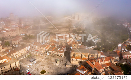 Bird's eye view of misty Trujillo, Spain Bird's eye view of misty Trujillo, Spain 122375173