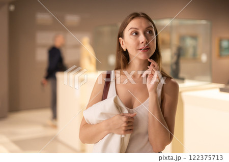 Thoughtful Woman in the Museum Hall Thoughtful Woman in the Museum Hall 122375713